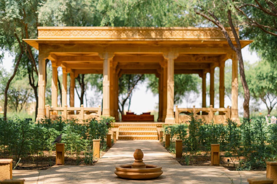 Explore the serene traditional courtyard at Suryagarh Hotel, Jaisalmer, India. Ideal for cultural experiences.